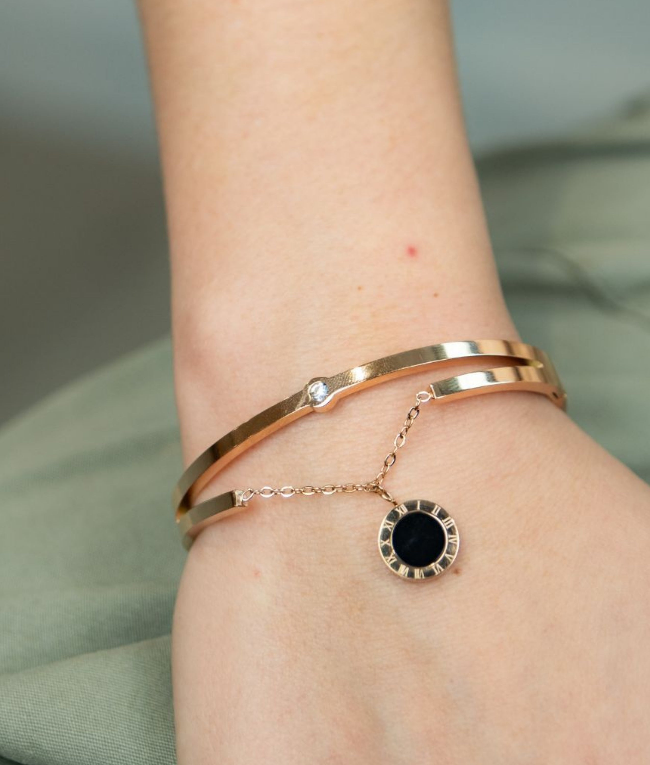 Elegant Rose Gold Bracelet with Black Stone